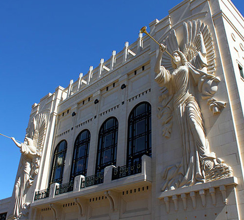Bass Performance Hall's balcony and angel figures on the exterior