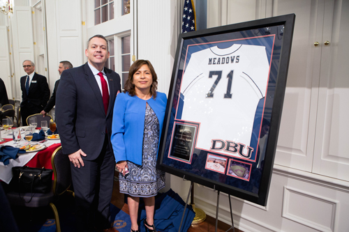 Picture of DBU Vice President for Enrollment, Dr. Cory Hines, and Maria Meadows, widow of long-time Patriot baseball supporter Jared Meadows