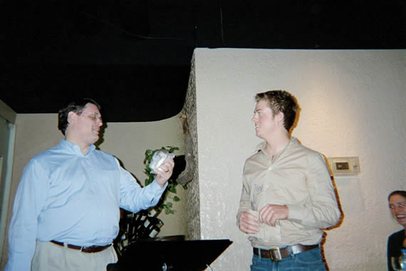 picture of two men facing each other talking