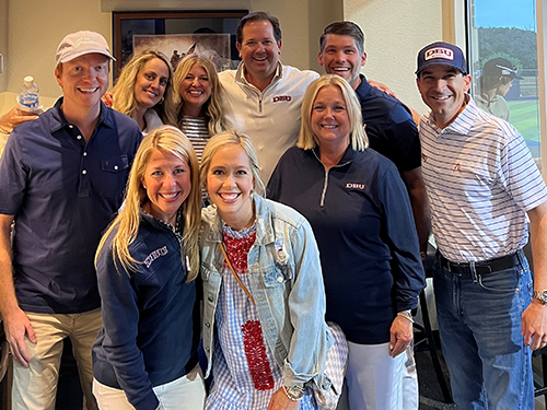 Rob Hahn standing with a group of people from DBU