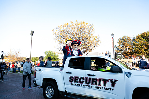 Don Kabetzke driving the DBU Security truck during a homecoming parade