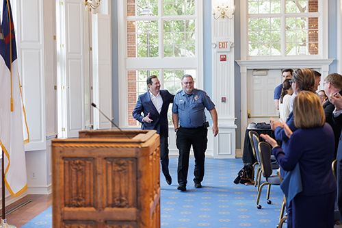 Dr. Wright and Don walking together at the staff appreciation luncheon