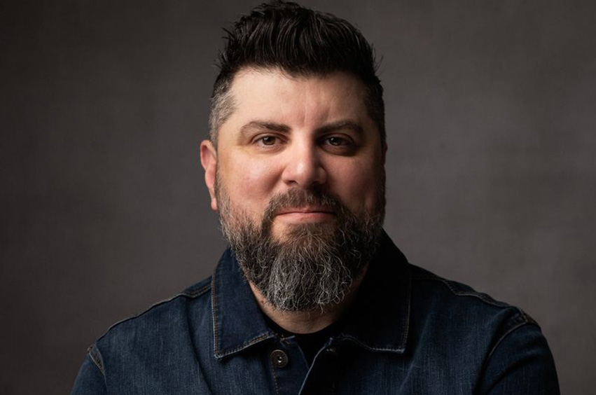 headshot of songwriter and music producer, Chris Clayton