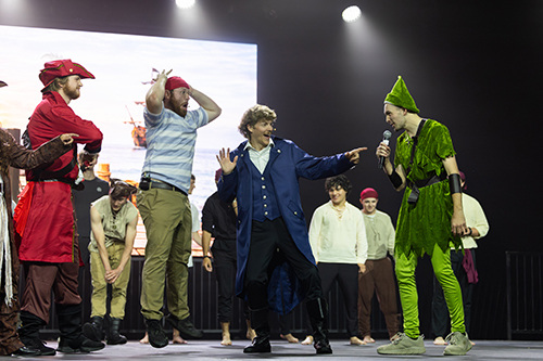 Texas college students performing a stage scene for Spring Sing event