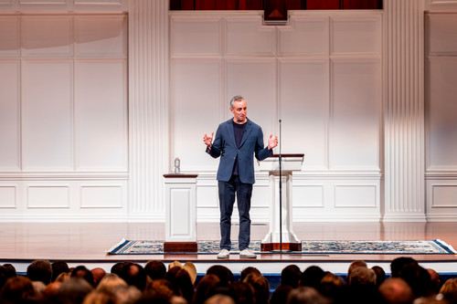 Will Guidara on the stage in the DBU Pilgrim Chapel sanctuary