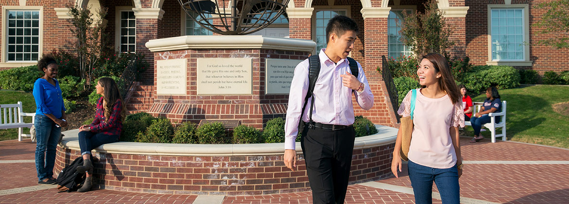 dallas university students walking outside of global missions center