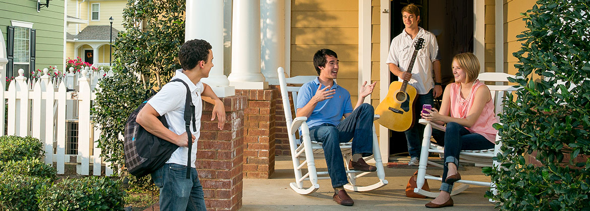 college students outside at townhomes in dallas texas