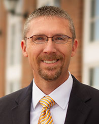 headshot of justin gandy