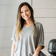 picture of a woman standing outside smiling