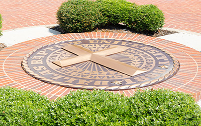 DBU cross seal on campus