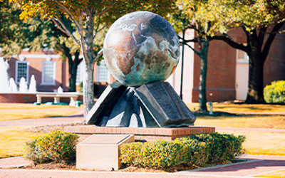 DBU globe statue