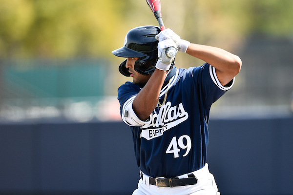 a baseball player waits for his pitch