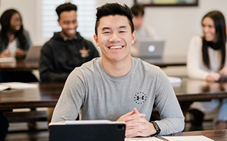 college student in Dallas, Texas sitting in a classroom learning