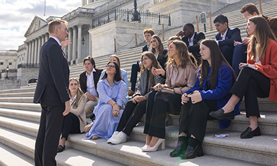 Christian college students in Washington, DC sitting on steps, learning about leadership