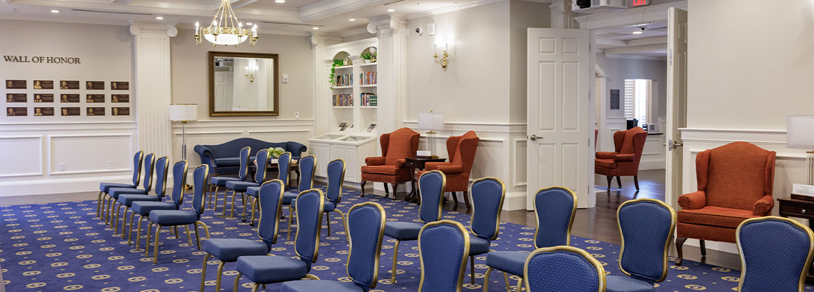 baptist history and heritage room with chairs spread-out into rows and bookshelves in the background