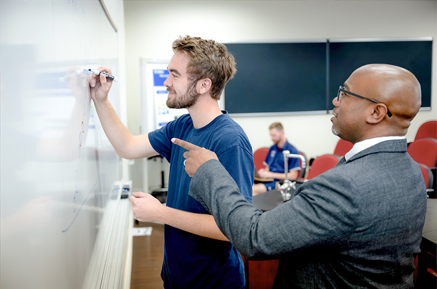 professor guiding student