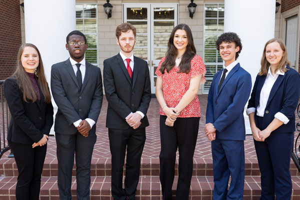 group photo of novice debaters