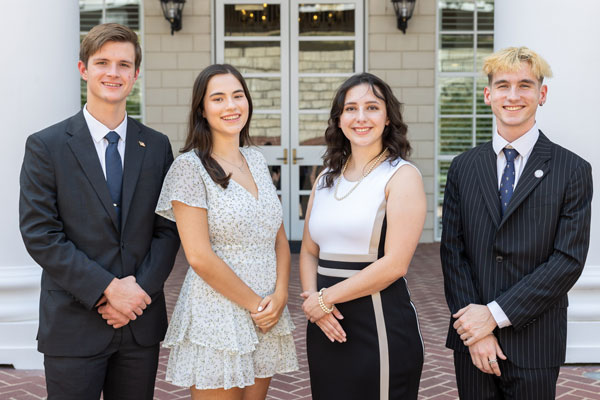 group photo of varsity debaters