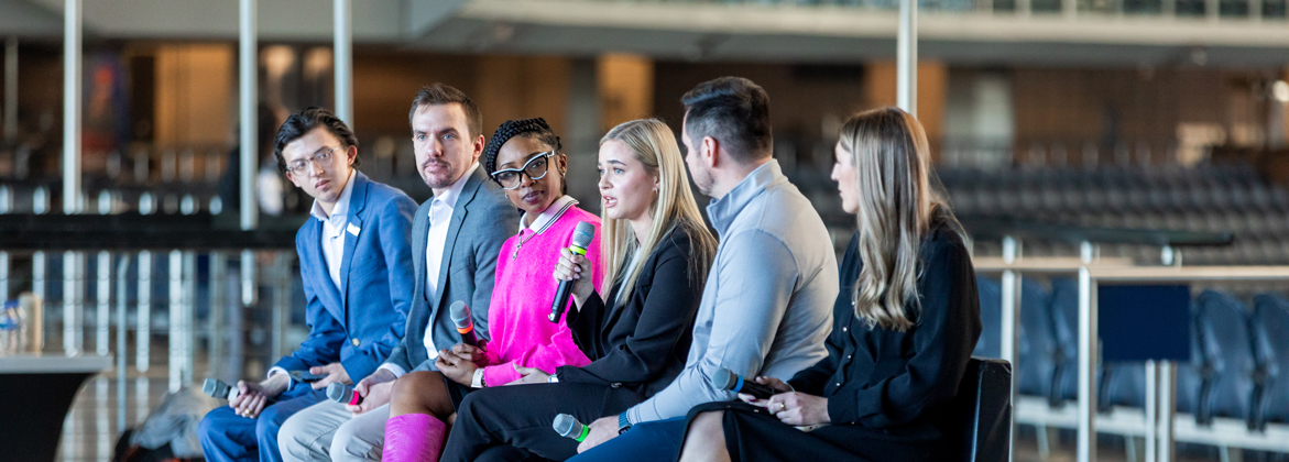 EBAM students on stage at a pitch event