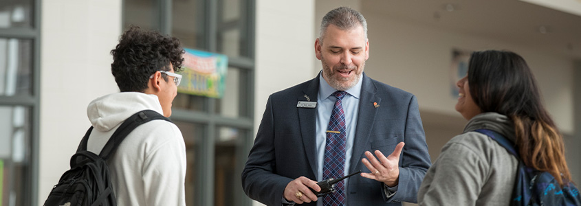 superintendent talking with students