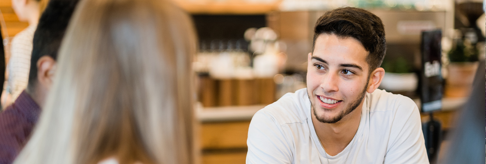 students talking on campus