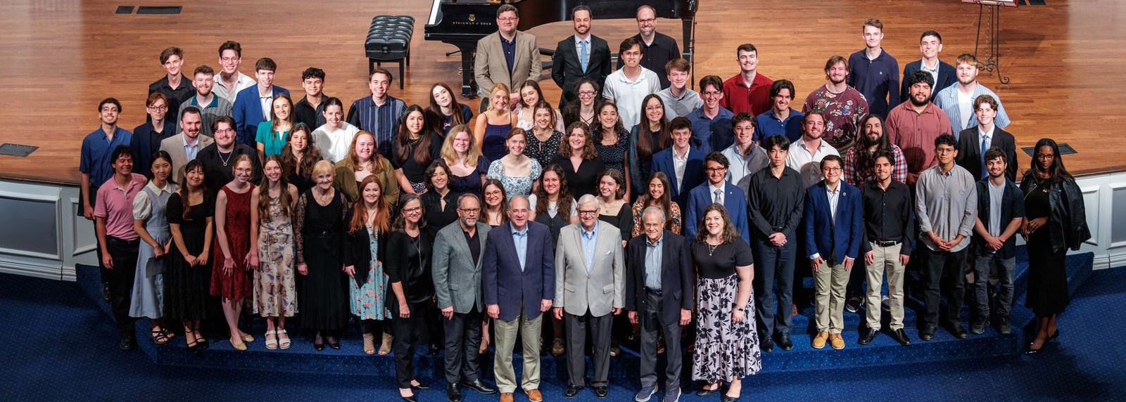 Students standing on stage