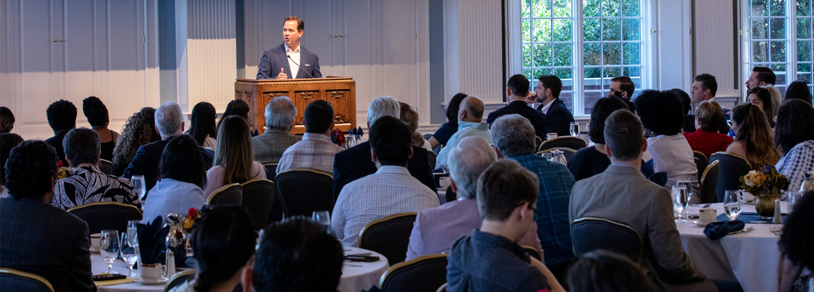 President Dr. Adam C. Wright presents at Graduate Orientation