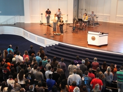 Students attending CASL 2012 worship in the Pilgrim Chapel at Dallas Baptist University during a general session.