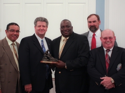 The 2012 Good Samaritan Award was presented to the DFW National Cemetery. Accepting the award on behalf of the cemetery, pictured (left to right) Bruce Boyea, cemetery representative; Ron Pemberton, director; Melvin Carson, foreman; Mike Mattiza, work leader; and Roy Martin, cemetery representative.