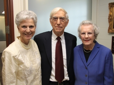 Dr. Glitner standing with other faculty members