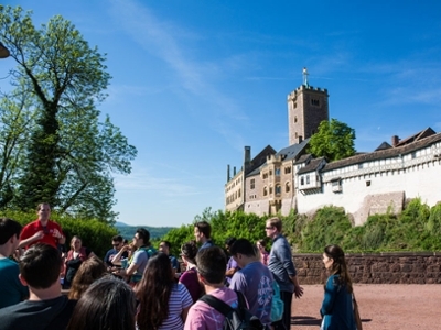 David Cook, J.D. lecturing students in front of Wartburg Castle