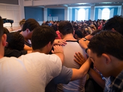 DBU students pray for fellow students impacted by Hurricane Harvey during Chapel on August 28, 2017 | Dallas, Texas