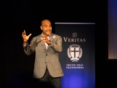 Dr. Gooloe speaking at the Inaugural Veritas Lecture Series