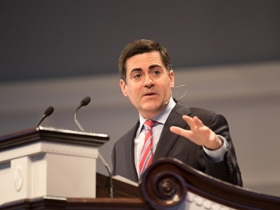 Russell Moore speaks from the podium in chapel