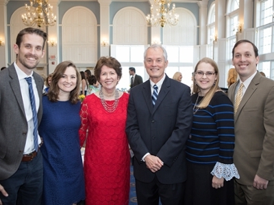 Dr. and Mrs. Gary Cook (center) along with their sons (far left) Mark Cook and his wife Shannon and (far right) Dr. David Cook and his wife, Nicole.