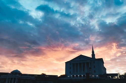 A photo of the DBU chapel during a sunrise