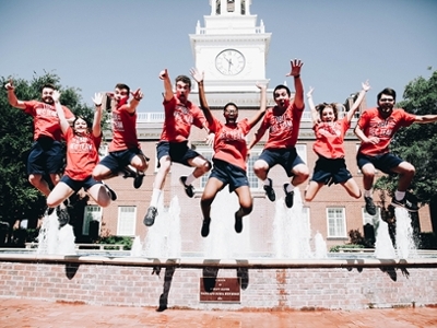 The Rec Team jumps off the fountain in front of the Mahler
