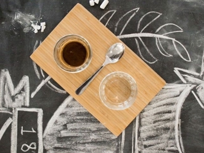 Coffee sitting on a tray on the chalk table in the DBU coffeehouse