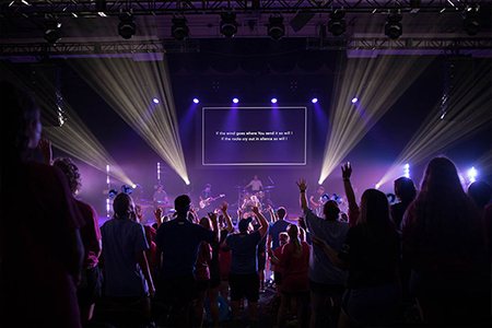 DBU students worshiping during welcome session - Dallas, Texas