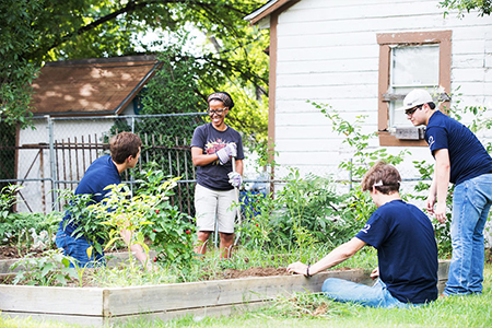 DBU students helping with a garden