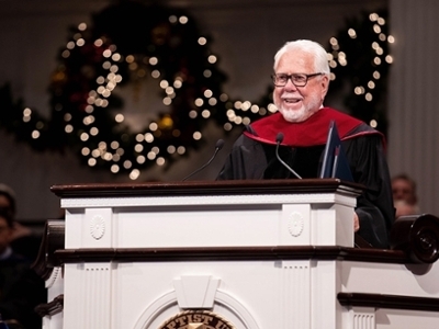 Norman E. Miller speaking during one of the December Commencement Services
