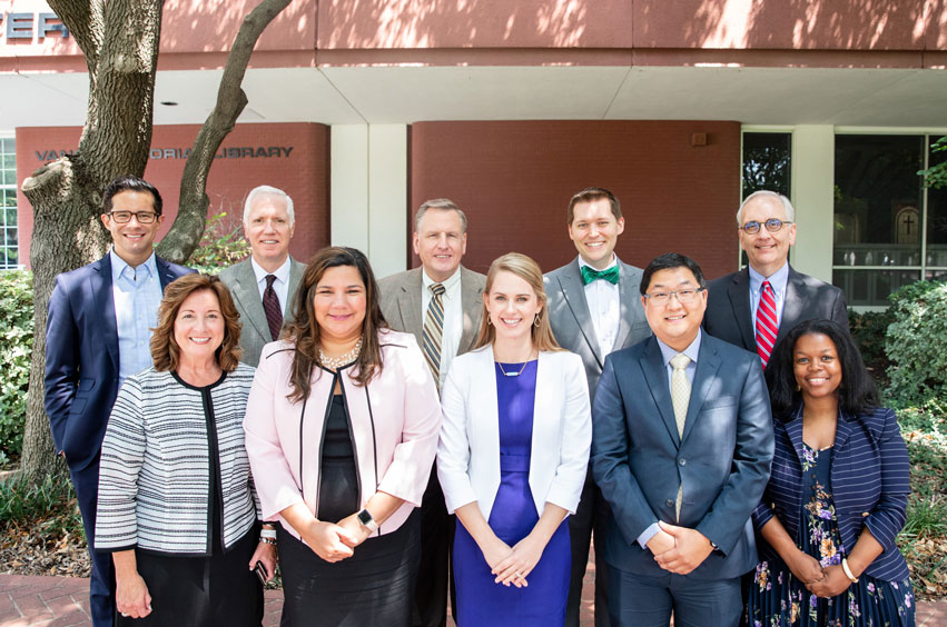 Dr. Norma Hedin, Provost, with new faculty members