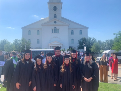 MAGL 2021 spring graduates in front of DBU Chapel
