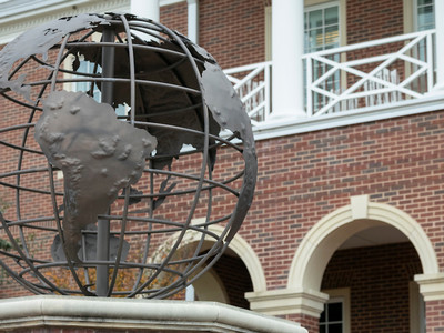 globe statue in Dallas outside of building at DBU