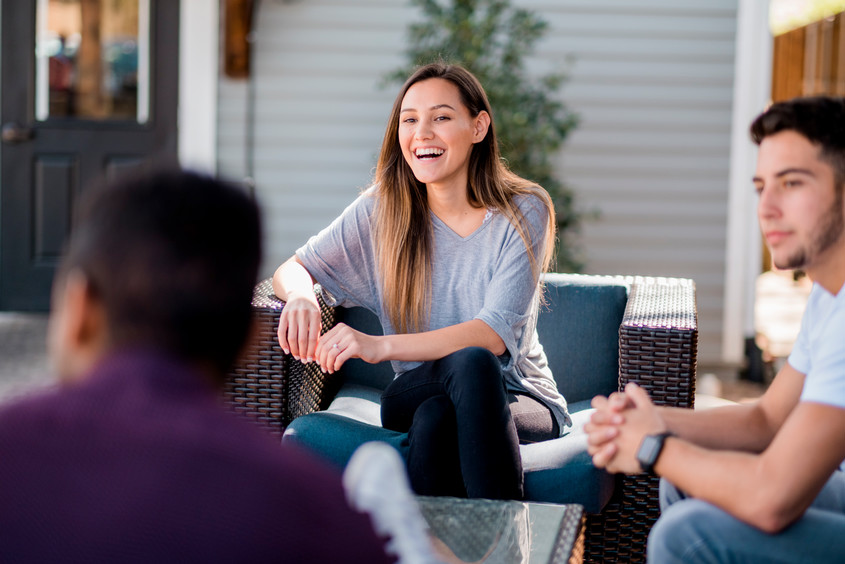 college student hanging out with friends outside