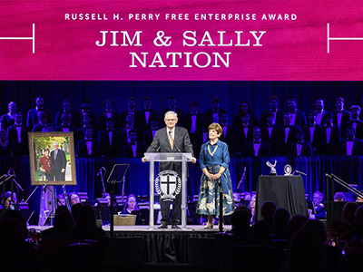 Jim and Sallay Nation standing on the stage at the Leadership Gala 2023