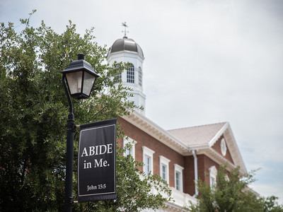 campus picture with Abide in Me – John 15:5 on campus banner