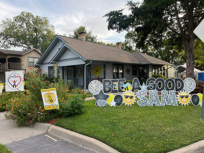 house in Garland, Texas with be a good sam sign in yard