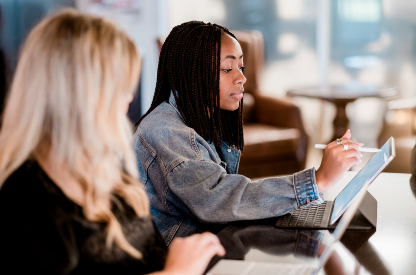 Student working on a tablet at the DBU coffeehouse