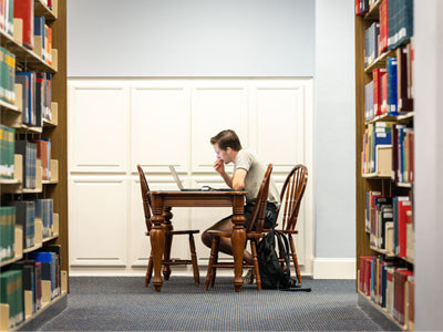 DBU student studying in library